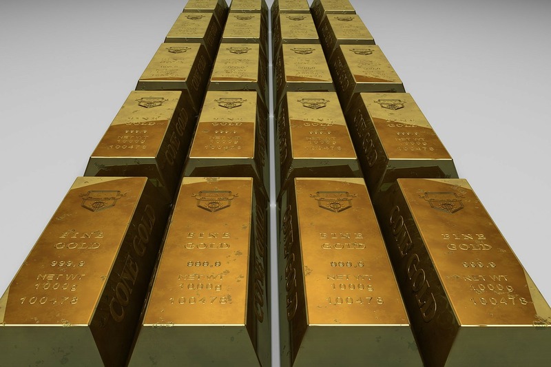 Metals - gold bars in a straight row